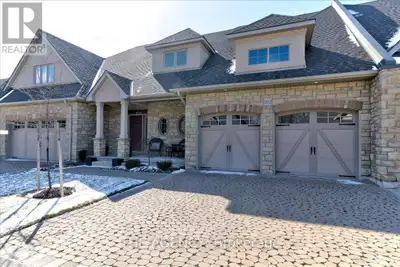 Welcome to 5 Wood Haven Drive, Unit 302 A Showcase Model Home with Premium Upgrades! Experience luxu...