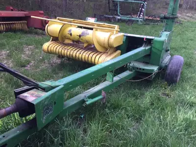 John Deere 3950 Harvester. 2 row corn head and forage pickup. Nice condition. Well maintained and al...