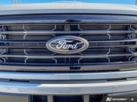 Immerse yourself in the bold design and capability of the 2026 Ford F-150 XLT, a striking all-white... (image 9)
