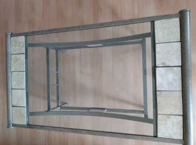 Modern coffee table with matching end table. Has marble tiles for design and no sharp corners it has...