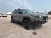 2022 Jeep Cherokee Trailhawk Elite Available Now at Loeppky Auto Sales Take on every adventure in co... (image 6)