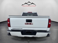 The 2019 GMC Sierra 1500 Limited 4WD Double Cab Standard Box in a striking white color is a robust t... (image 3)
