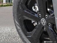 This Volkswagen Taos boasts a Intercooled Turbo Regular Unleaded I-4 1.5 L/91 engine powering this A... (image 7)