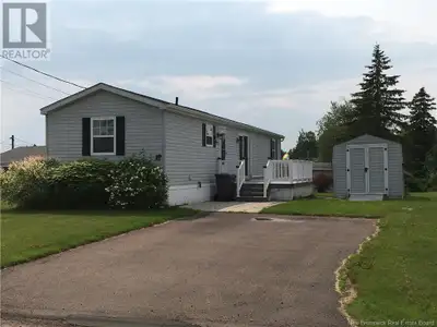 Welcome to 61 St-Jean Drive A Move-In Ready Mini Home in the Heart of Dieppe! Tucked away in a quiet...