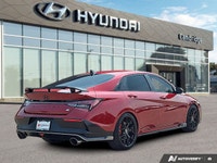 The 2025 Hyundai Elantra N, cloaked in striking Ultimate Red, delivers an adrenaline rush with its f... (image 4)