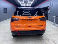 For a quick response please text 403-820-9940. AMVIC licensed business The 2026 Jeep Compass Trailha... (image 5)