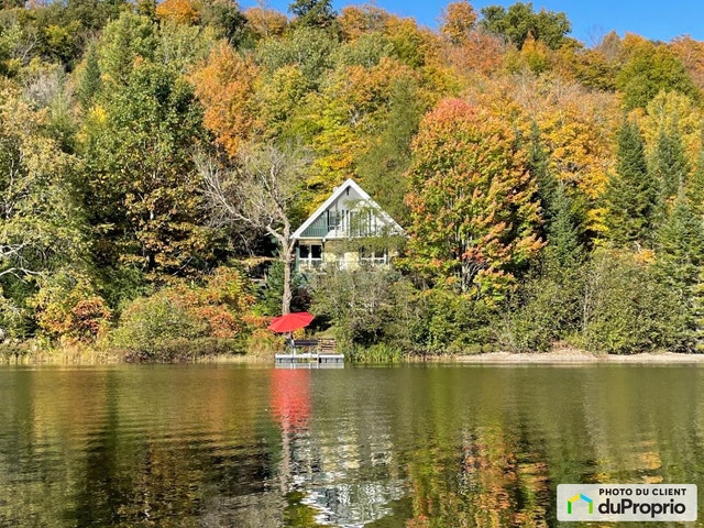$485,000 - Cottage for sale in Mont-Blanc (St-Faustin-Lac-Carré) — photo 1