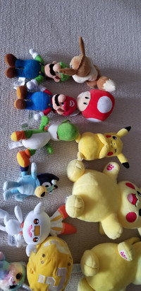 Pokemone and Mario plushies