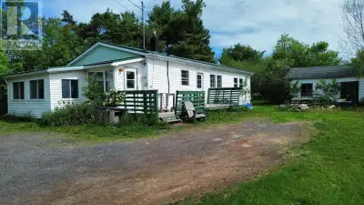 Spacious 4 bedroom, 1 bath home set on a beautiful 1 acre property offering privacy, space, and vers...