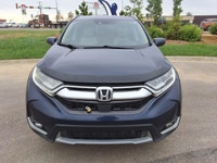NEW TO CANADA? WE HAVE AN APPROVAL WAITING FOR YOU! The 2017 Honda CR-V Touring is a well-rounded SU... (image 1)