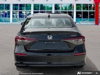 The 2026 Honda Civic Sedan Hybrid Sport Touring features an integrated navigation system to guide ev... (image 4)