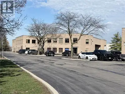 Ground floor warehouse with DOCK w/ leveller and 14'H GRADE level loading and your own GATED compoun...
