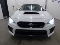 Imaginez tracer des virages avec un sourire, le grondement iconique d'une Subaru WRX blanche 2018 so... (image 2)