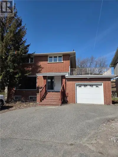Location, Location! Don't miss this large all brick home just a short walk to Bell Park. This two st...