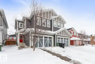 GREAT FAMILY HOME! 2-storey 1/2 duplex w/ dbl att garage, offering 1900 sf of comfortable living spa...