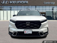 The 2026 Honda CR-V Hybrid Touring isn't just an SUV; it's your efficient and sophisticated partner... (image 7)