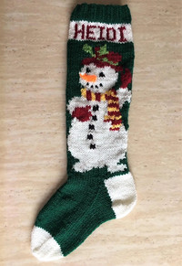 Hand knitted Christmas stockings from Mary Maxim's designs