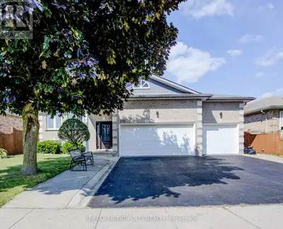 Welcome to this spacious and inviting raised bungalow, perfectly situated in the desirable Shades Mi...