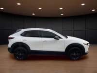 The 2022 Mazda CX-30 GT w/Turbo AWD in stunning white exudes confidence and offers a smooth handling... (image 4)