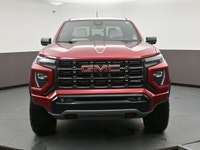 The 2023 GMC Canyon AT4X is a rugged midsize truck built for serious off-road capability and everyda... (image 1)