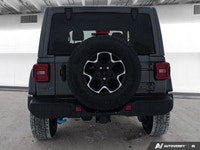 This *2021 Jeep Wrangler 4xe Unlimited Rubicon* combines legendary off-road capability with modern p... (image 4)