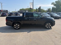 2019 Honda Ridgeline Touring AWD – Luxury, Capability & Reliability Loeppky Auto Sales is proud to o... (image 5)