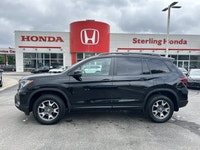 Conquer every adventure with the rugged yet refined 2023 Honda Passport TrailSport, a vehicle engine... (image 7)