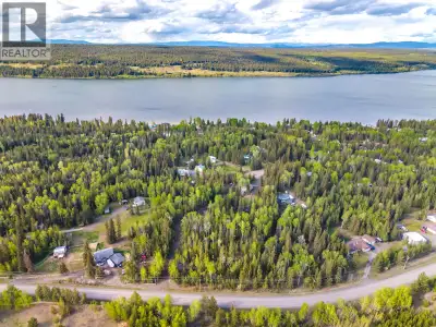 Over two acres! There is a driveway in down the left side of the property - fairly level and well tr...