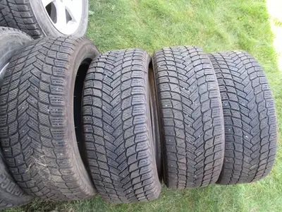 4 Michelin X-Ice Snow winter tires. - Tire size is 235/55/18 - Approx. 90% tread depth remaining; 9-...