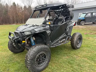 This RZR has some Impressive upgrades and it works Excellent It is a 1000cc Automatic with High and...