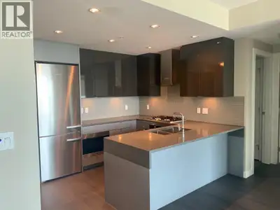 Call Bria at 778-949-4499 to book a showing. This 27th-floor 2-bedroom, 2-bathroom condo at Sovereig...
