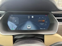 Experience the exceptional performance of the 2015 Tesla Model S P85D, a stunning silver AWD sedan r... (image 9)