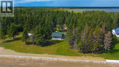 WATERFRONT COTTAGE!! Here is the perfect opportunity to own a beautiful waterfront cottage! Situated...