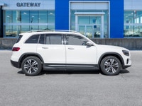 The 2024 Mercedes-Benz GLB 250 stands out in a bold White finish that complements its boxy, modern S... (image 2)
