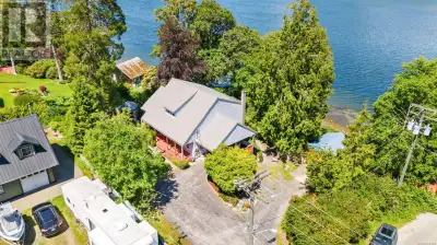 A rare chance to own a waterfront home in the heart of Ucluelet, complete with two cozy rental cotta...