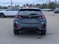 The pre-owned 2024 Subaru Crosstrek Onyx in Blue with a Grey interior delivers rugged versatility, m... (image 4)