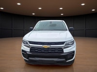 Introducing the 2021 Chevrolet Colorado 2WD Work Truck in a pristine white finish, this extended cab... (image 1)