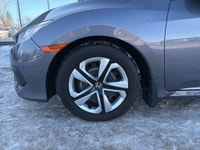 Reliable, efficient, and stylish this 2018 Honda Civic LX is the perfect daily driver! Powered by a... (image 9)