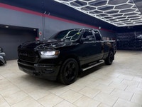 The 2019 Ram 1500 Sport 4x4 Quad Cab in a majestic black on black configuration exemplifies power, s... (image 1)