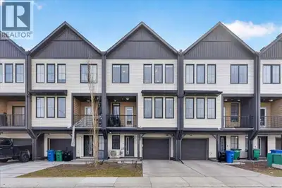 Welcome to this beautifully designed townhouse in the sought-after community of South Point, Airdrie...