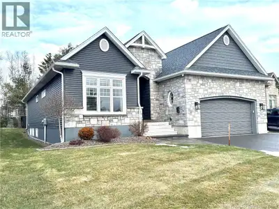 Welcome to 56 Bobak Place, Fredericton, New Brunswick, an extraordinary ""Net Zero"" executive garde...