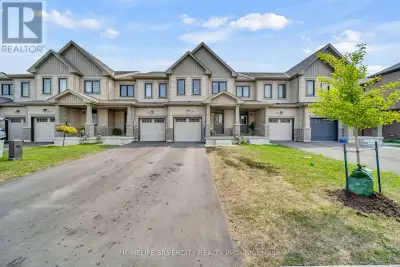 This beautiful freehold townhome is just 1.5 year new, open concept, living area with modern kitchen...