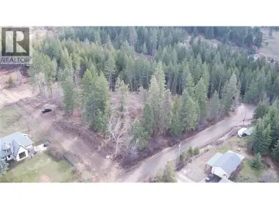 Rare 5.24-acre parcel in North BX, privately situated at the end of Ranch Road. Property includes a...