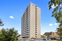 Fully renovated spacious suite features kitchen with modern features and finishes including laminate... (image 4)