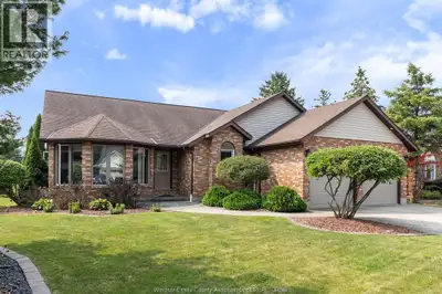 Pristinely kept 1962 sq ft brick to roof ranch style home with attached heated 2 car garage and trip...