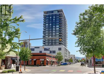 Discover luxury in this 11th floor corner unit condo in downtown Kelowna, boasting panoramic city, l...