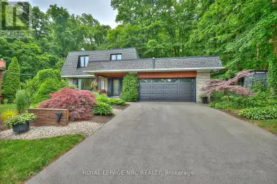 *Gorgeous Renovated Home on a Forested 1/2 Acre in Prestigious Glenridge* Welcome to this stunning t...