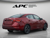 The 2024 Nissan Sentra SV CVT is a stunning red, front-wheel-drive sedan that promises to deliver a... (image 9)