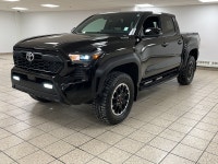 Engineered for drivers who want capability without compromising conscience, this 2025 Toyota Tacoma... (image 1)