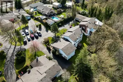 Unbelievable value for a spacious end-unit townhome with a private garage! This 2 bedrooms and 1 bat...